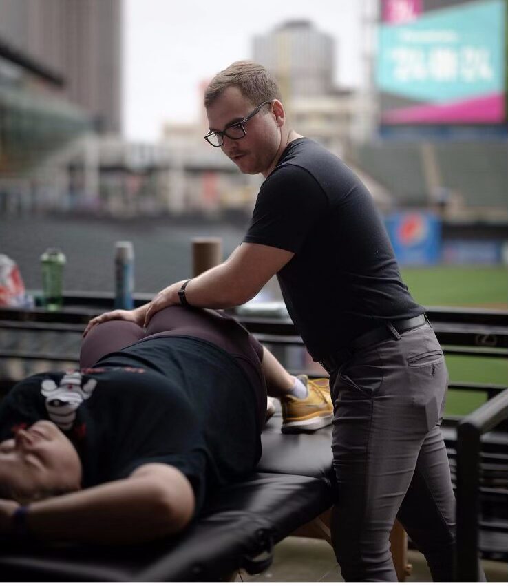 Patient performing guided rehab exercises with therapist